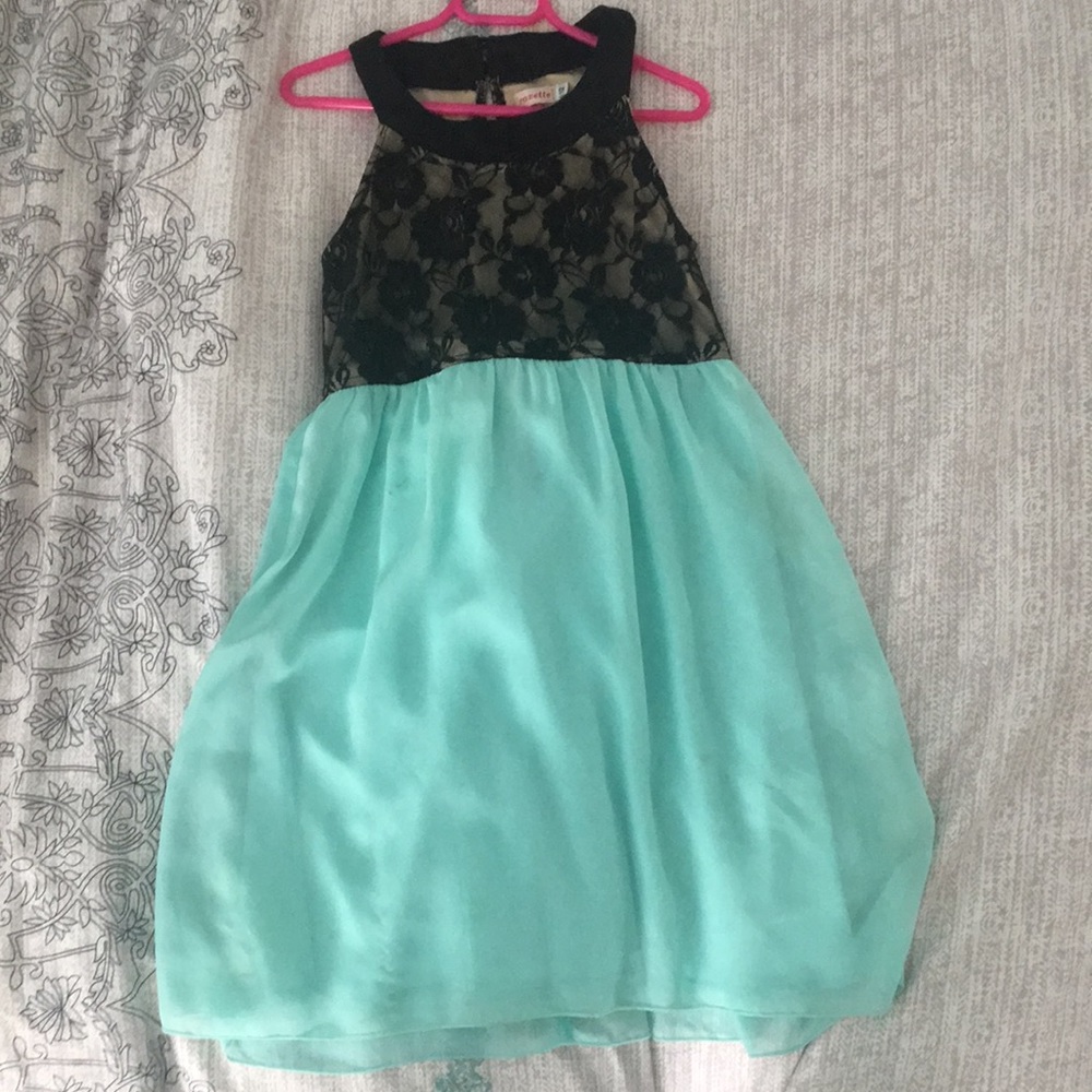 A black and teal dress